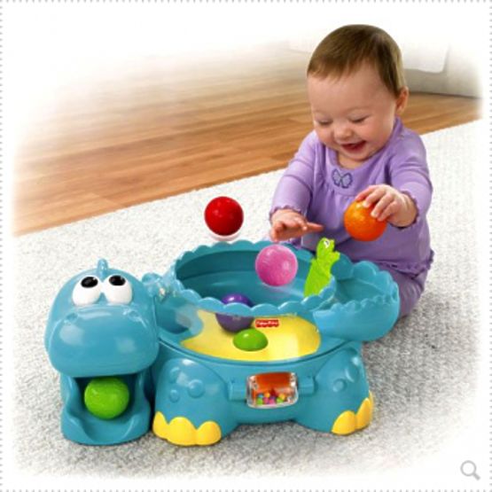 Fisher Price - GO BABY GO - hudobný dinosaurus