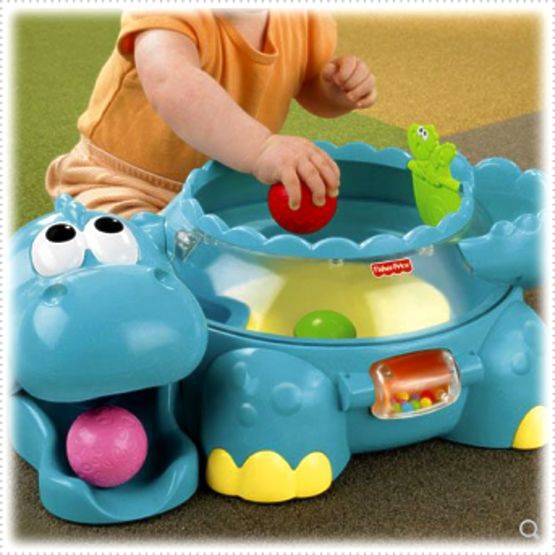 Fisher Price - GO BABY GO - hudobný dinosaurus